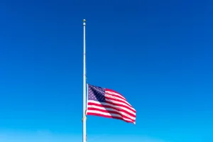 Flag raised at half staff