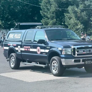 A Fire Police truck parked at a community event