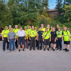 The volunteer firefighters posing for a group photo